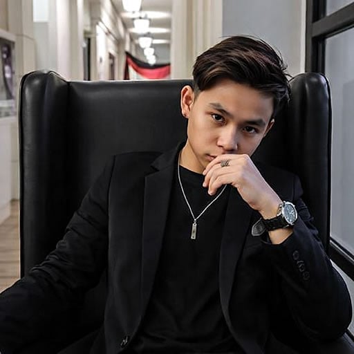 Stylish marketing strategist mid-conversation, captured in a confident, dynamic pose. Embodies the cool-headed precision and creative firepower that powers high-level CRM and brand campaigns.